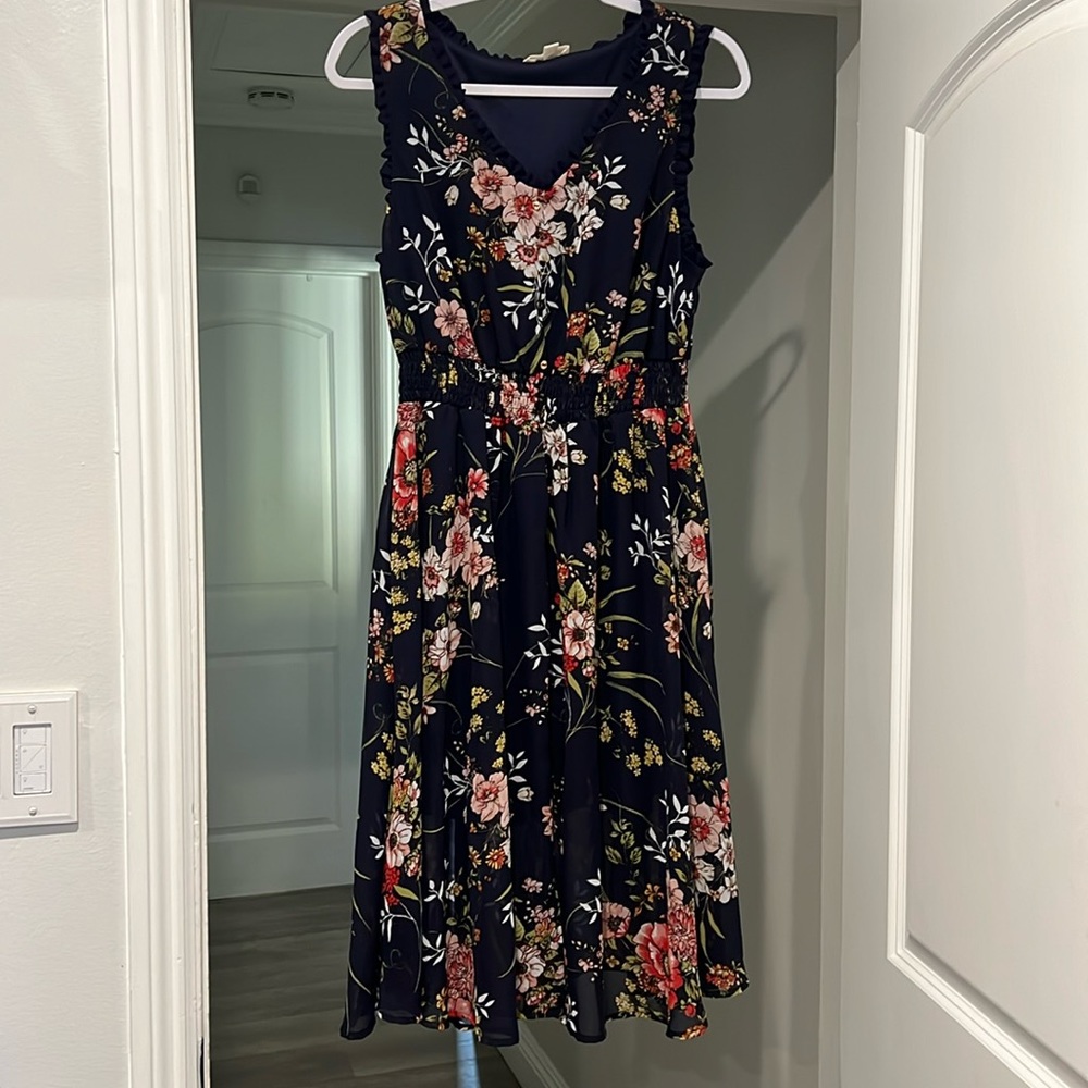 Royal blue floral dress. Sleeveless.